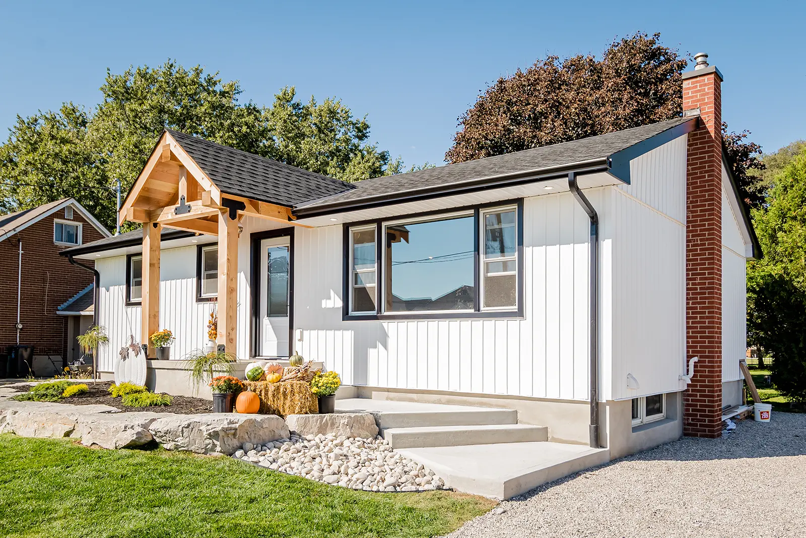 Exterior upgrades by MD Construction featuring new siding for enhanced curb appeal.