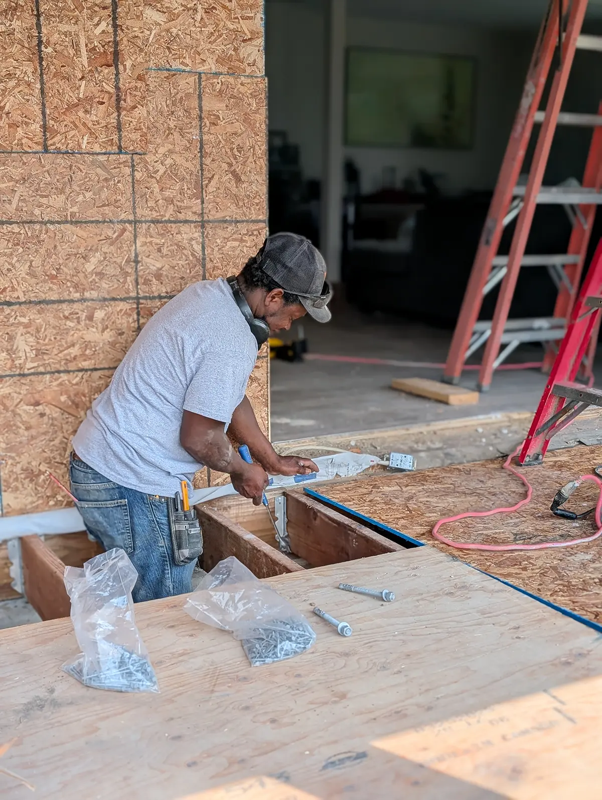 MD Construction working on a home renovation project with precision craftsmanship.