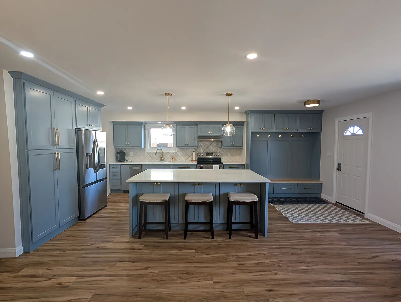 Modern kitchen interior completed by general contractor MD Construction as part of their home renovations services.