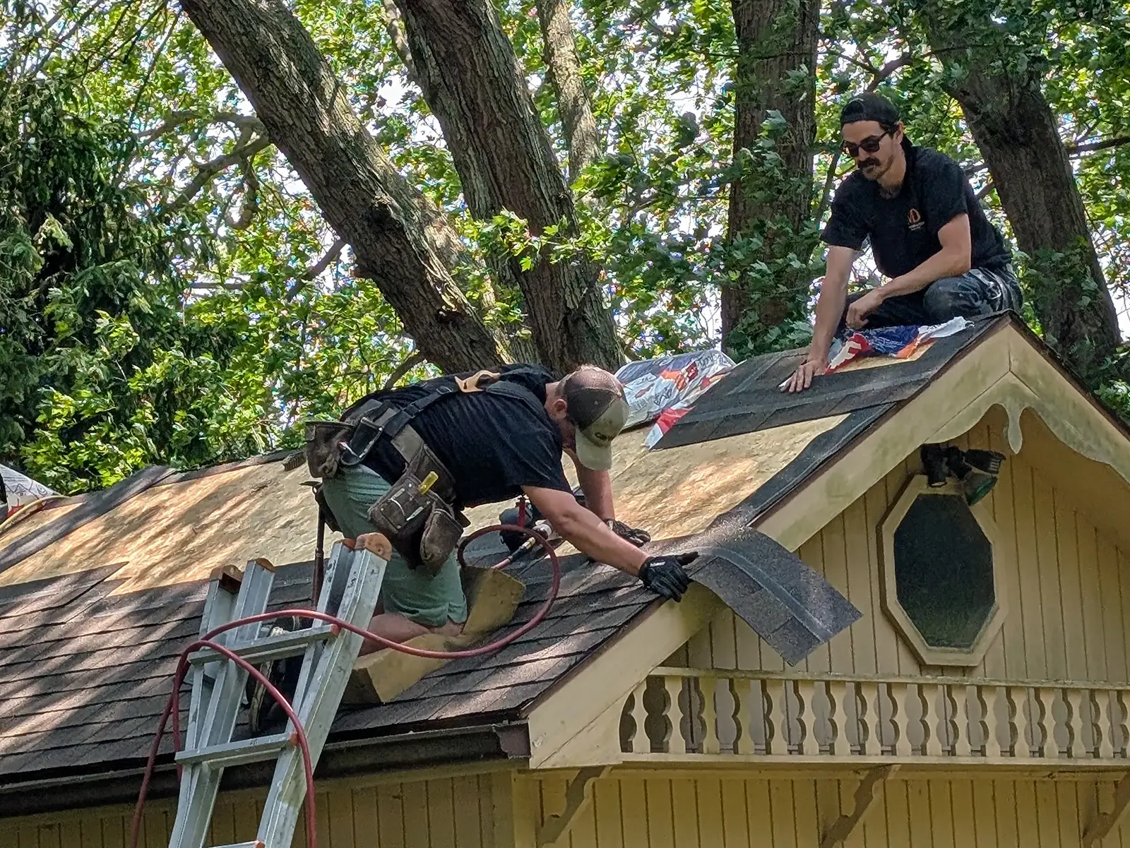 MD Construction team performing roof repair